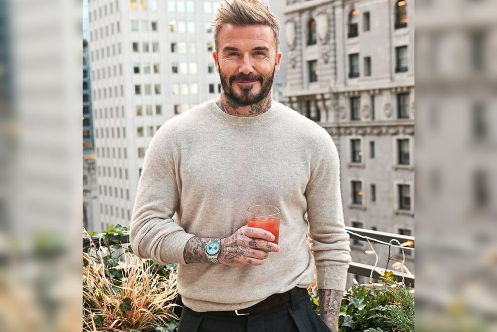 david beckham flaunts tudor's flamingo blue black bay watch