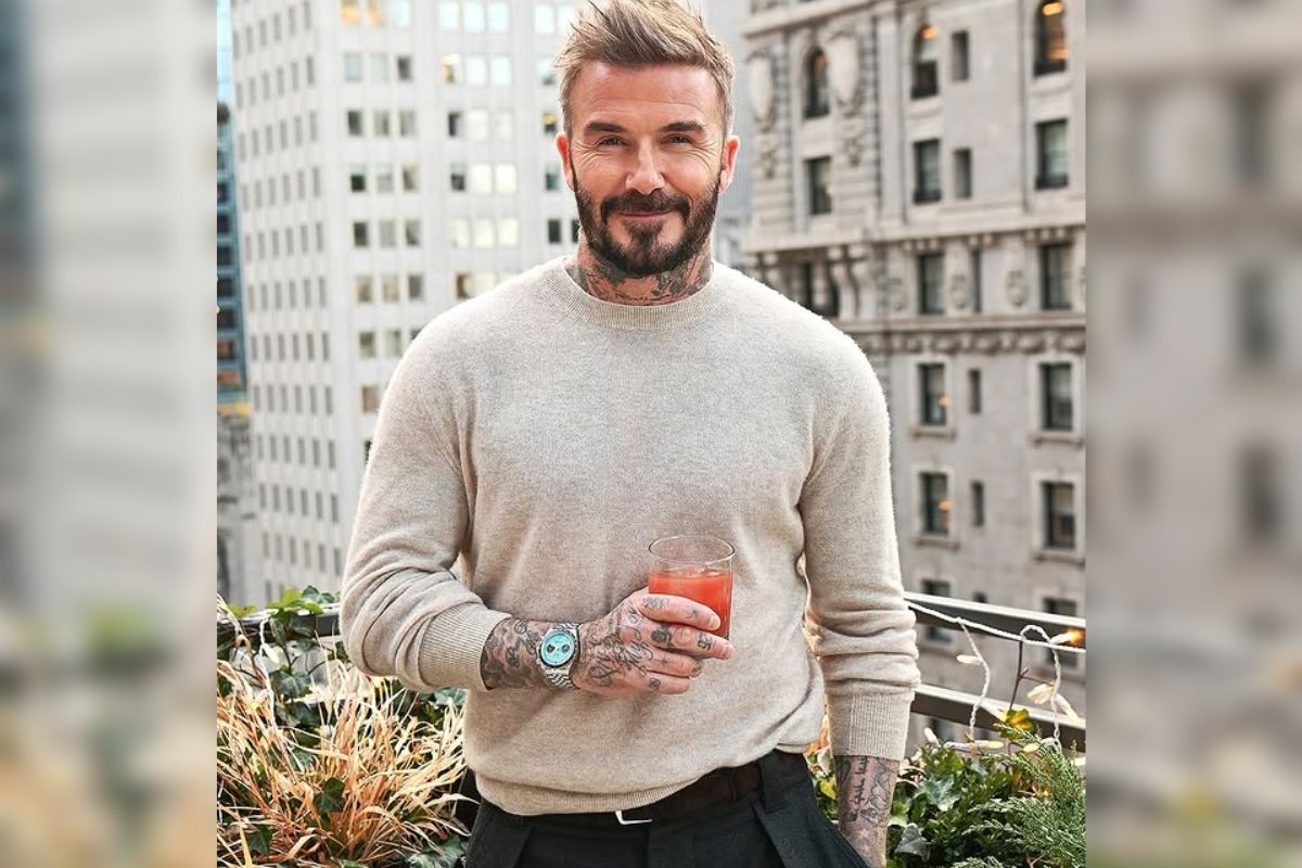 david beckham flaunts tudor's flamingo blue black bay watch